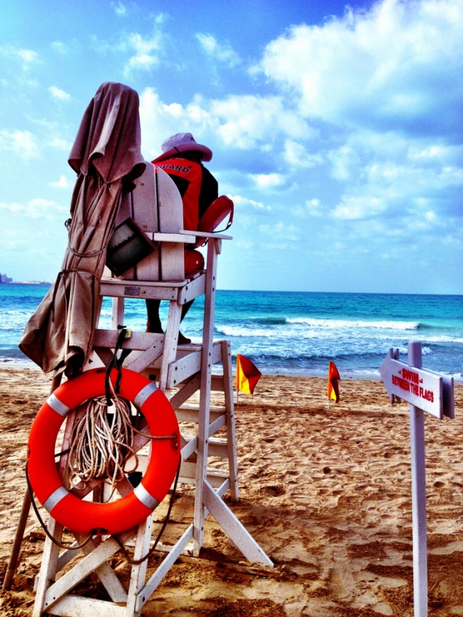 [Image: Image by @PhilipBloom - This lifeguard is taking NO chances with the choppy ocean today! :) on Propic]