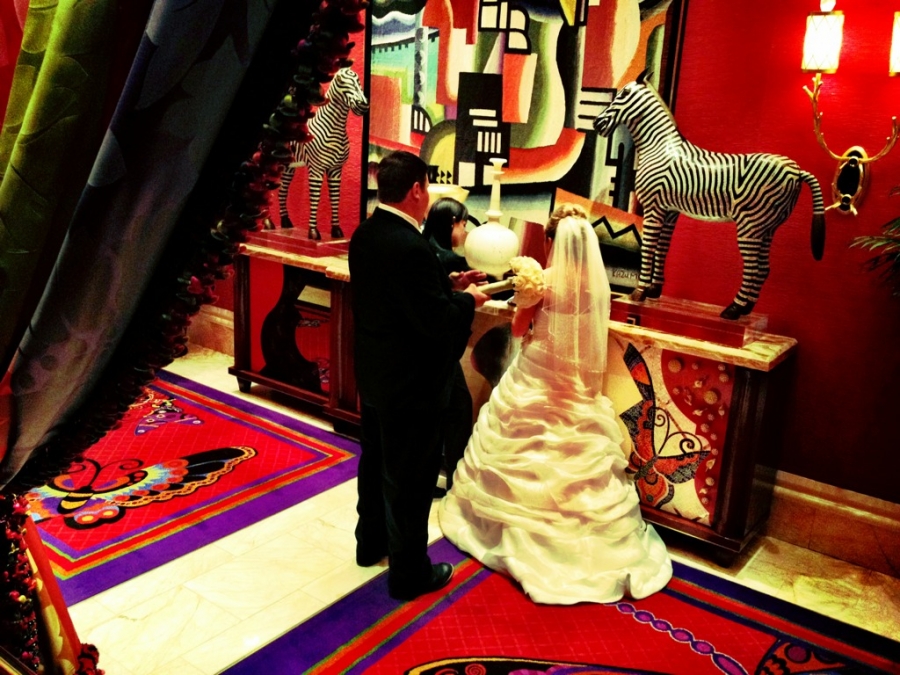 [Image: Image by @vincentlaforet - Wedding couple signing "job data form" w official hotel photographer outside elevators...How romantic! To each his own! on Propic]