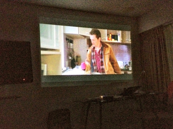 [Image: Image by @PhilipBloom - Watching an underrated movie on hotel room wall. Fantastic 10 foot HD image from the pico projector. Guess the film on Propic]